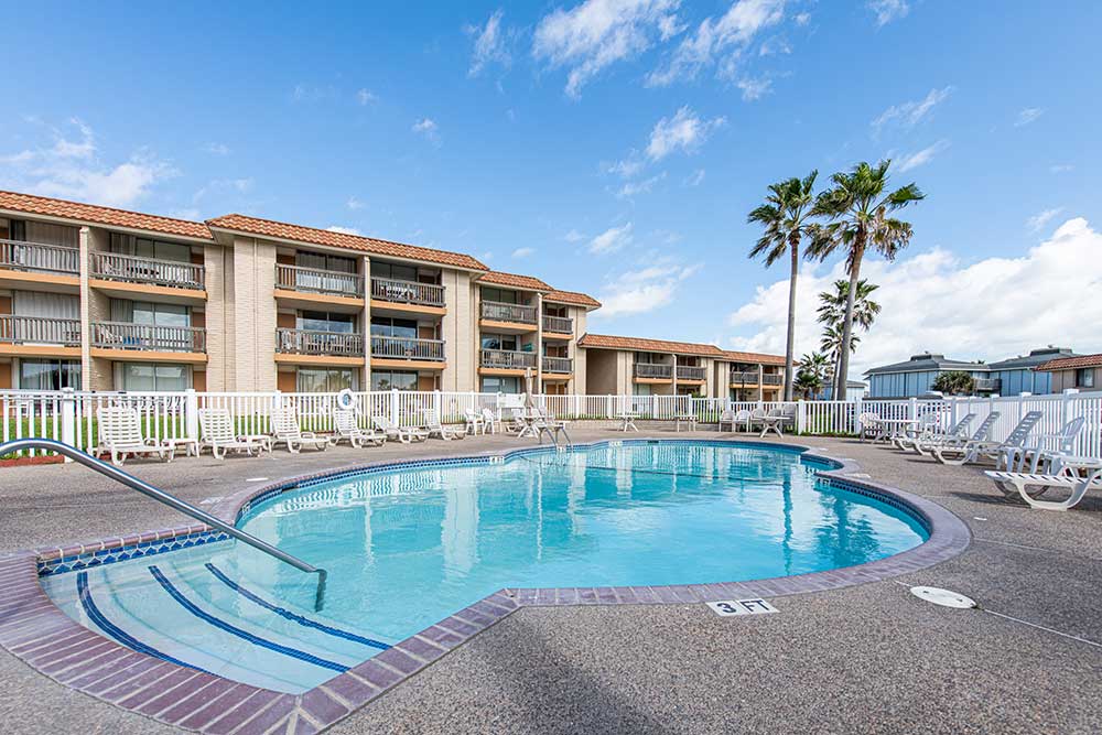a medium-sized outdoor pool at a port aranasas condo complex