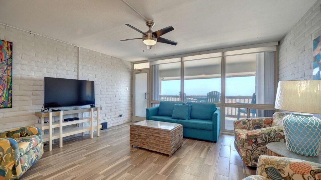 Living room at Coral Cay Beachfront Condominium.