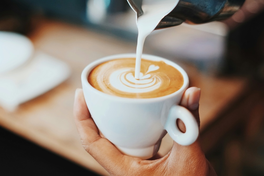 Barista making an espresso drink
